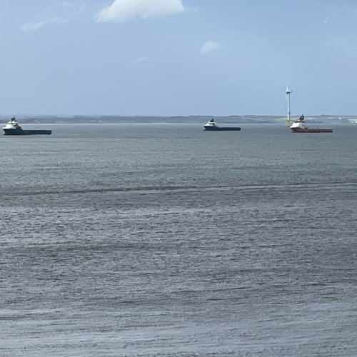 Container ships waiting to enter Aberdeen harbour